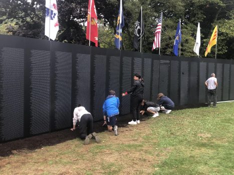 HS History Club helps out the Traveling Veteran Wall.